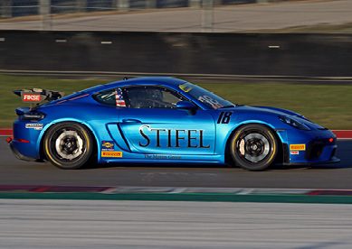 Image of blue race car with Stifel | The Maxim Group on the side